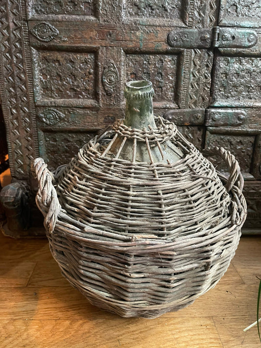 Very old demijohn carboy in its original wicker, vintage dame jeanne blown glassware 1900s