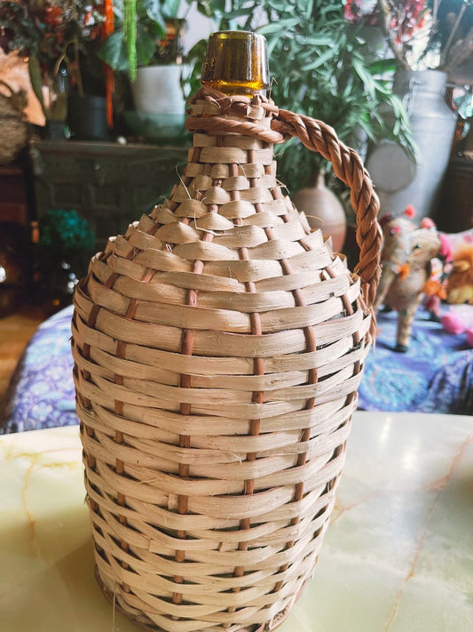 Ancien Amber Dame Jeanne with it original wicker, amber demijohn 1960s